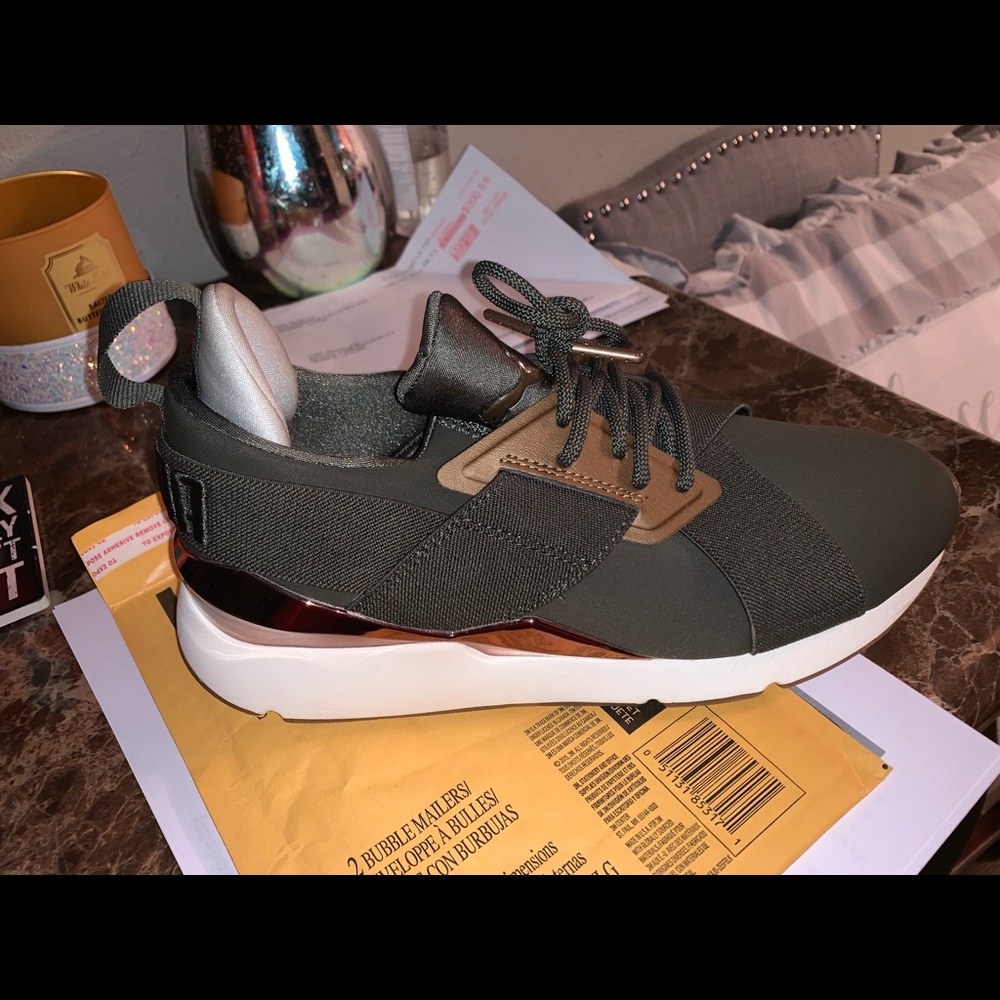 Army green puma sneakers